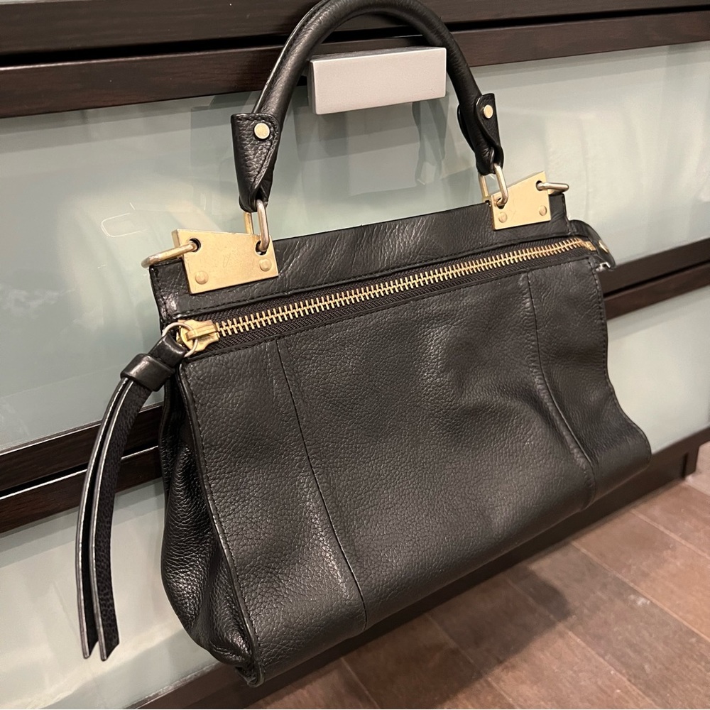 Foley + Corinna black purse
